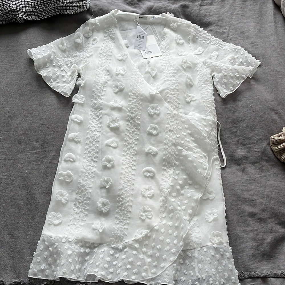Fit and flare wrap dress white with floral appliqués NWT